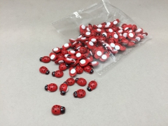 A000QF Box of 120 mini red ladybirds